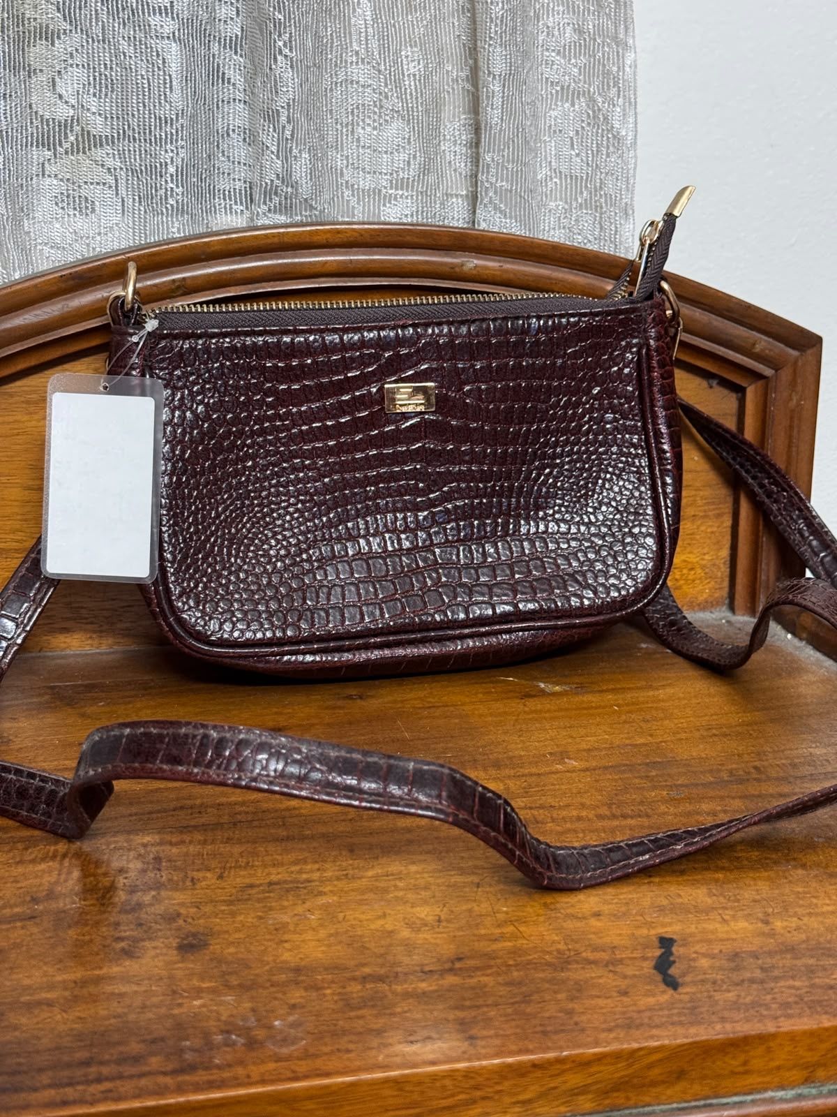 Sreeleathers dark chocolate color medium size bag. Made in India