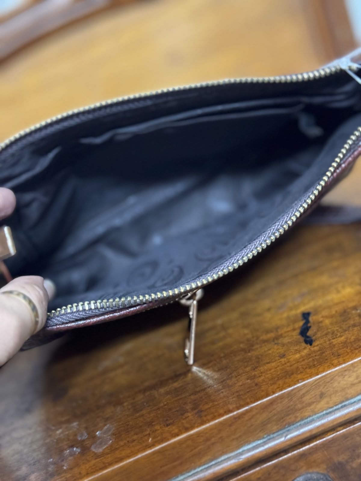Sreeleathers black color big side bag. Made in India.