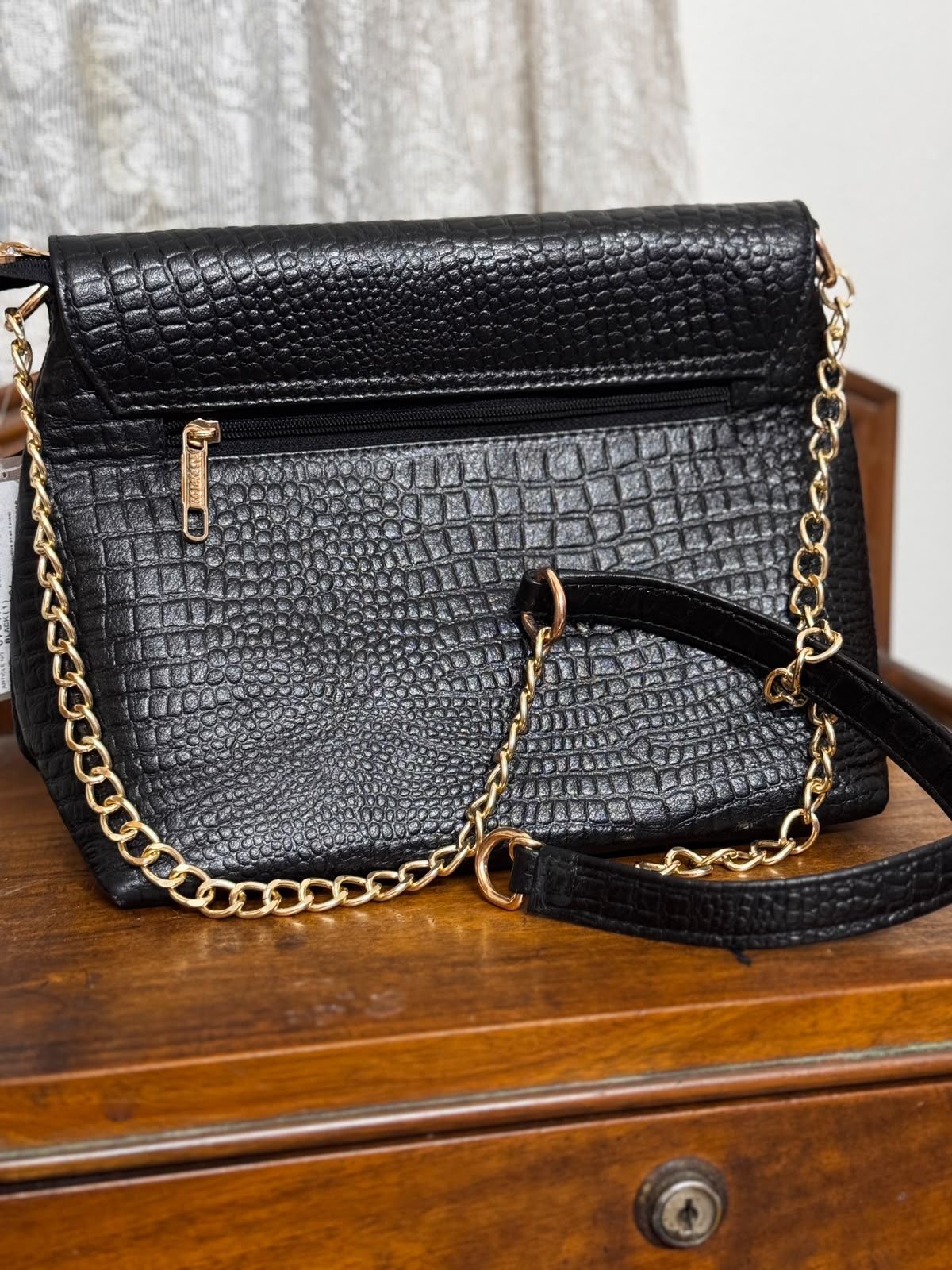 Sreeleathers black color big side bag. Made in India.