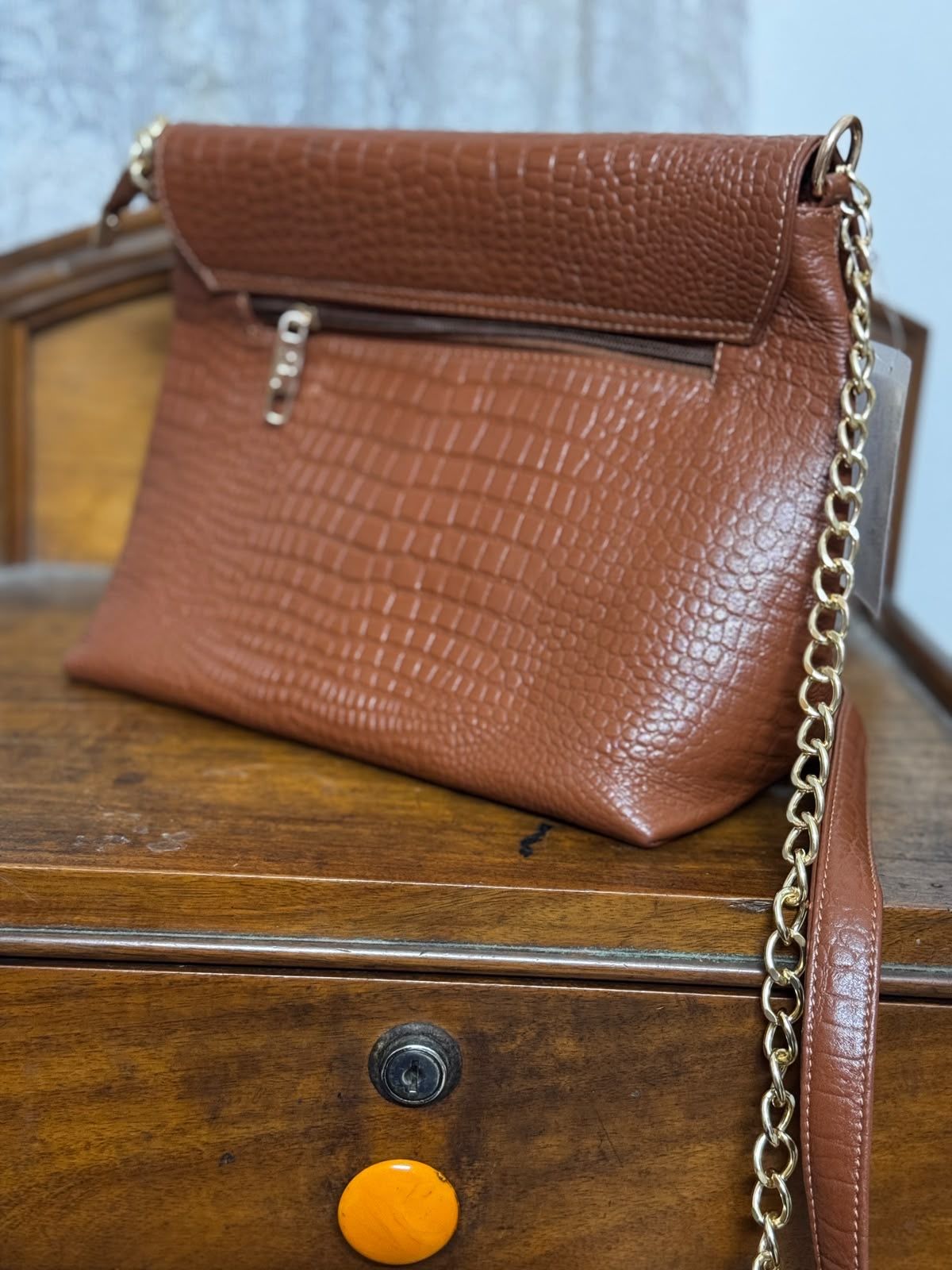 Sreeleathers brown color big side bag. Made in India.