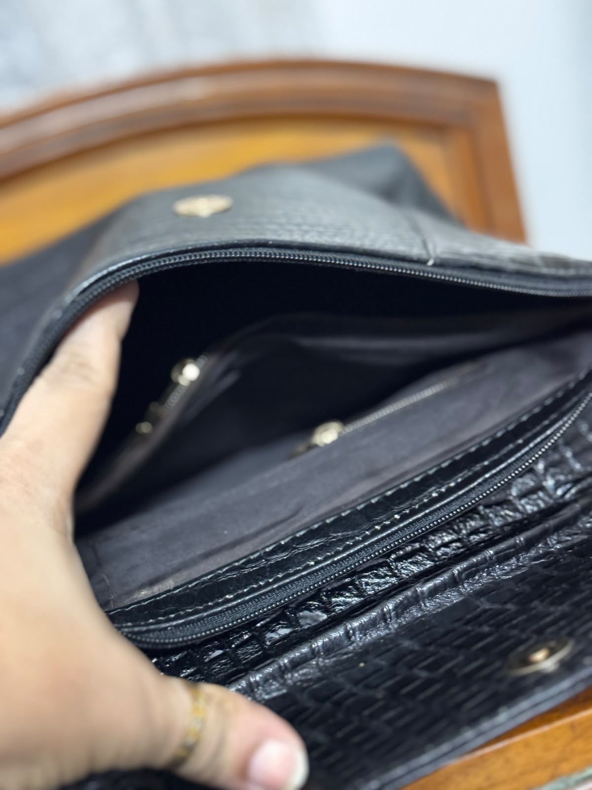 Sreeleathers black color big side bag. Made in India.