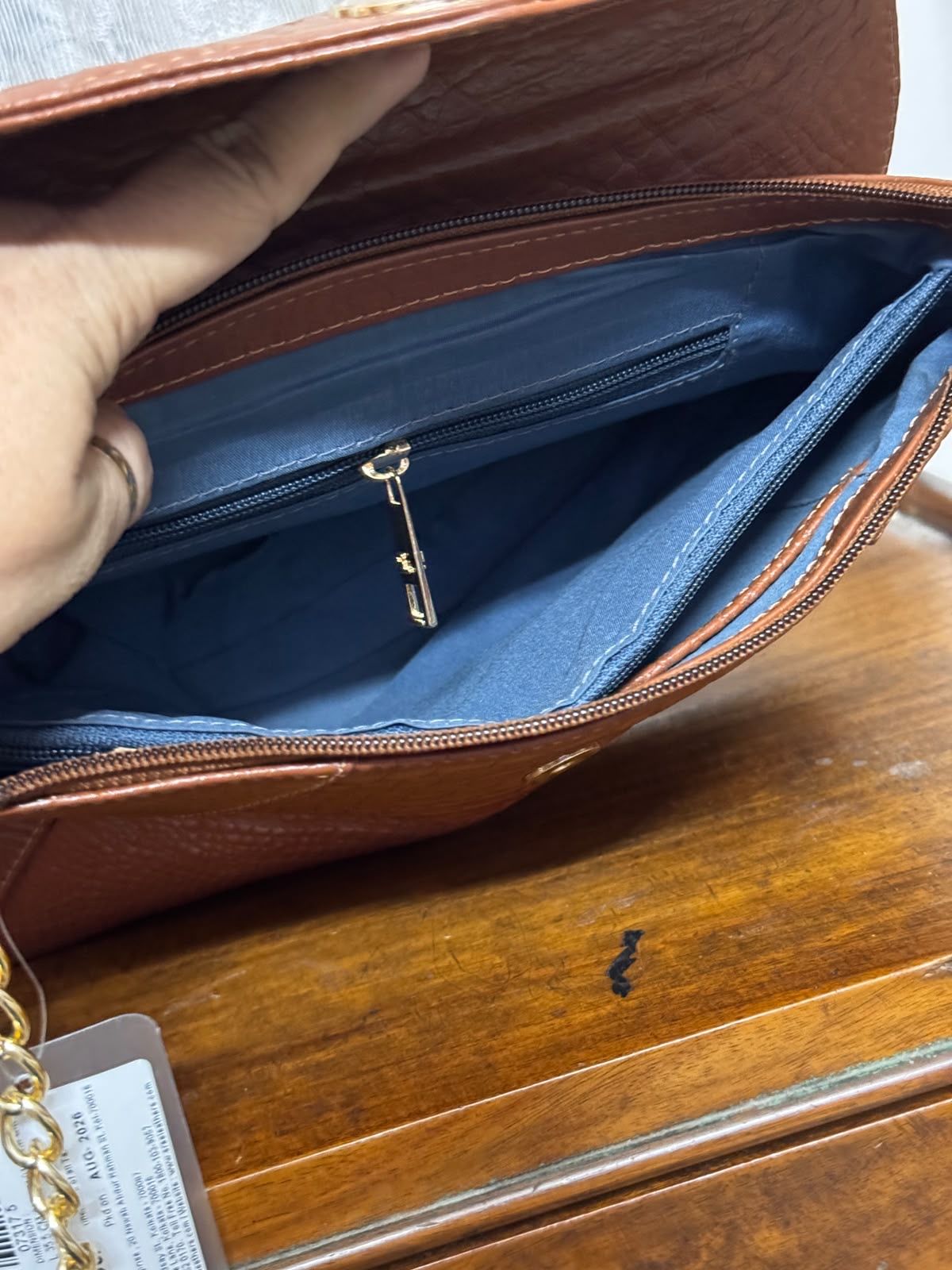 Sreeleathers brown color big side bag. Made in India.