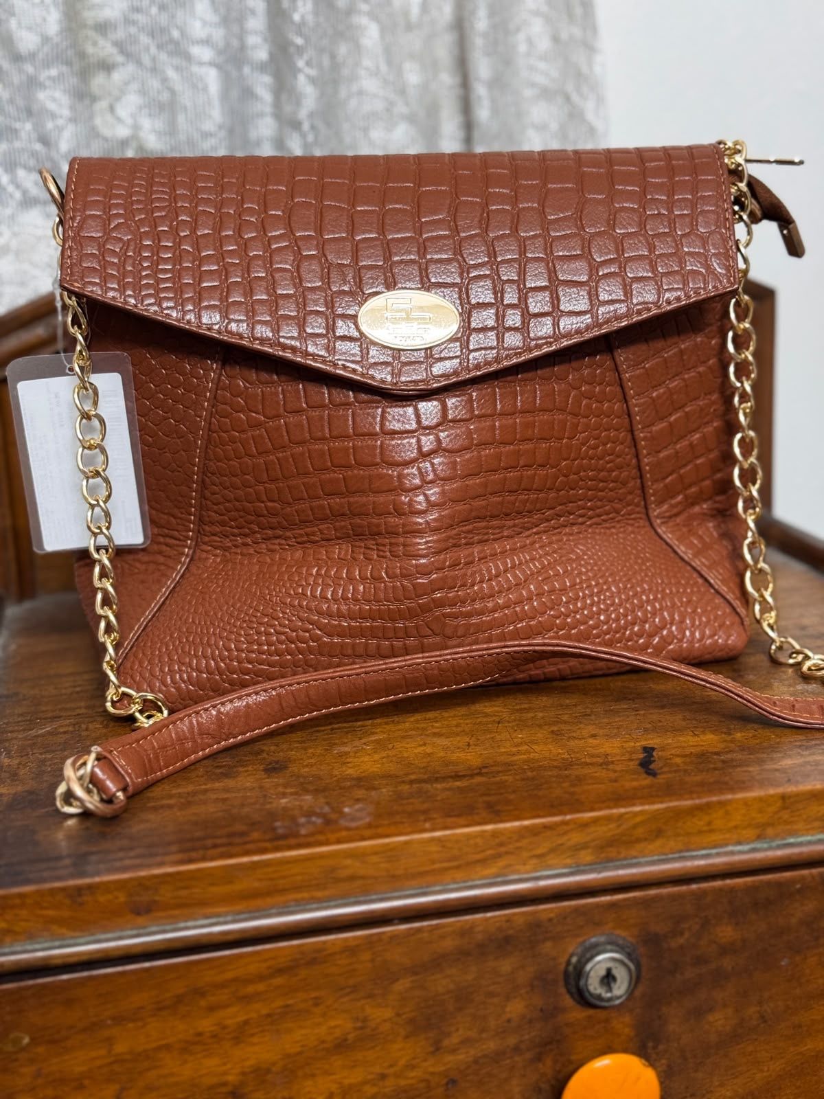 Sreeleathers brown color big side bag. Made in India.