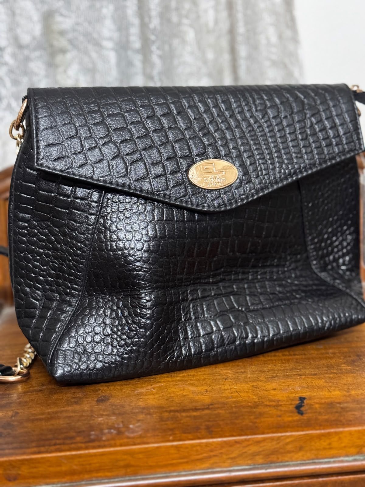 Sreeleathers black color big side bag. Made in India.